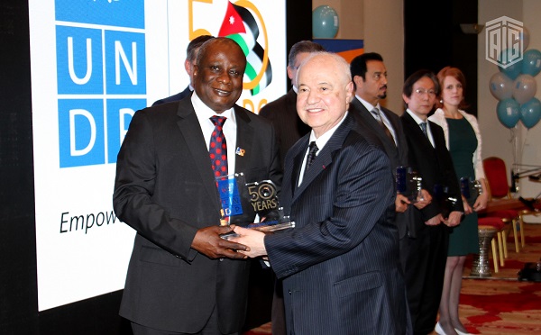 Edward Kallon, resident representative of the United Nations Development Programme (UNDP) honors HE Dr. Talal Abu-Ghazaleh during a special ceremony held under the patronage and presence of the Prime Minister Dr. Abdullah Al-Nsour 