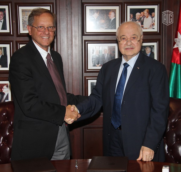 HE Dr. Talal Abu-Ghazaleh, and Mr. Roger Davies, Director of UNRWA Operations in Jordan, agree on capacity building programs for Palestinian refugees.
