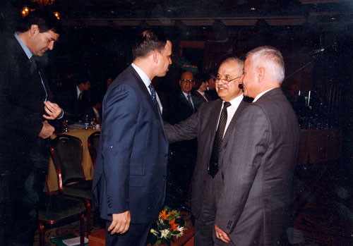 Prince Faisal in a discussion with Mr. Talal Abu-Ghazaleh