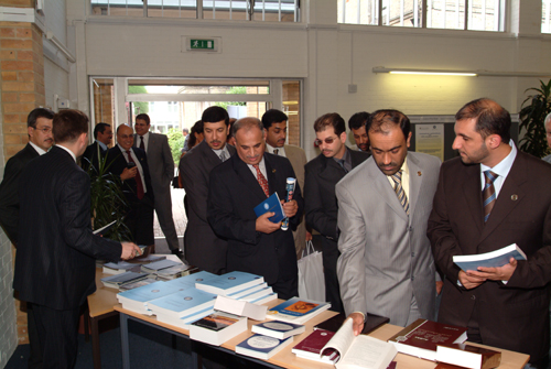 Guests admiring TAGorg publications, Cambridge, August 6, ...