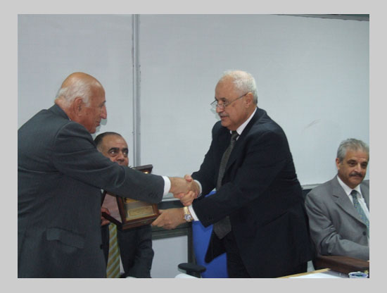 The ASIP shield is presented to Mr. Mohammed Asfour by ...